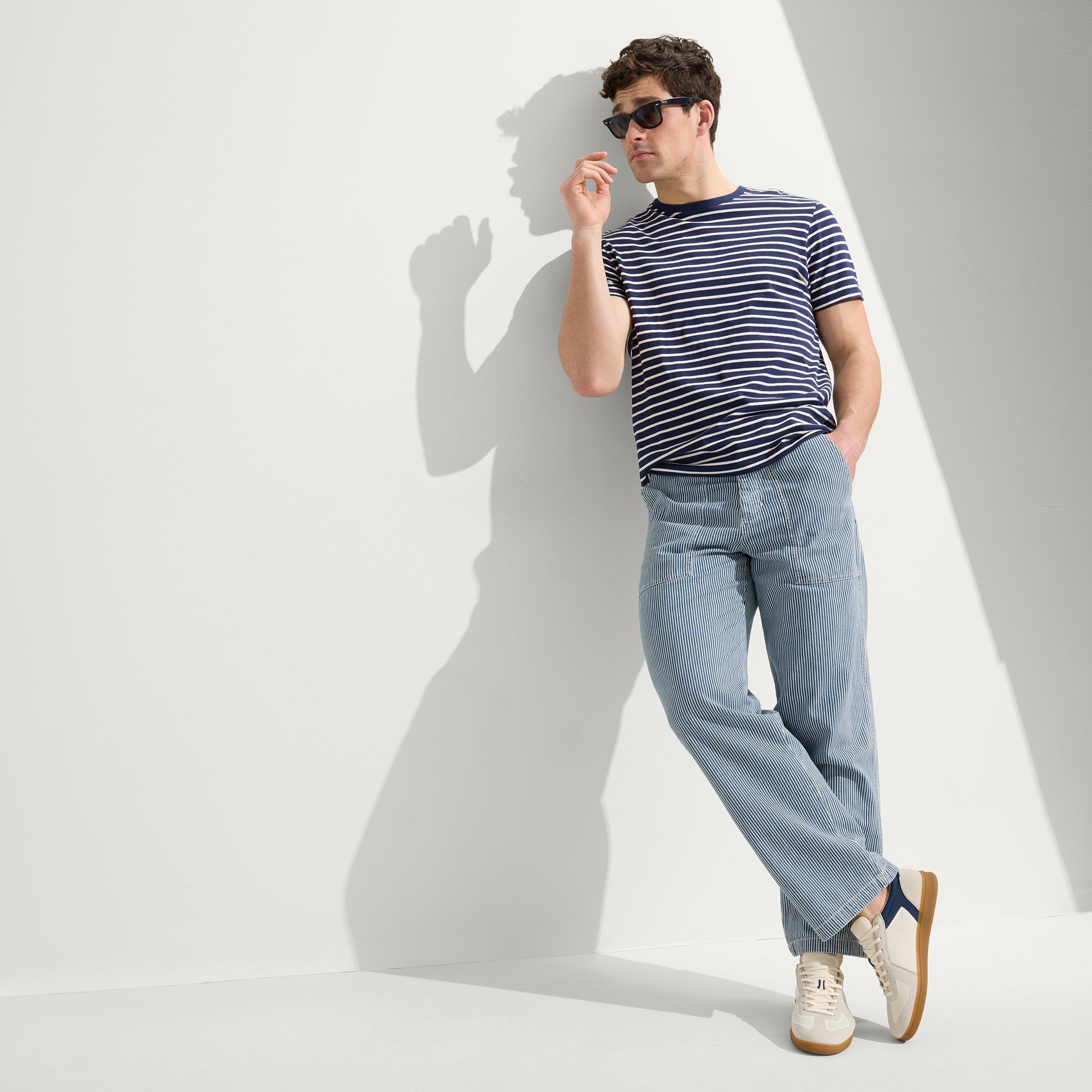 Alternate view of a model wearing The RS01 Sneaker in Hudson.
